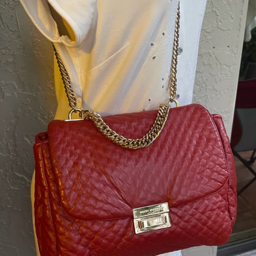 Kelsi Dagger red leather quilted pillow style with gold chain